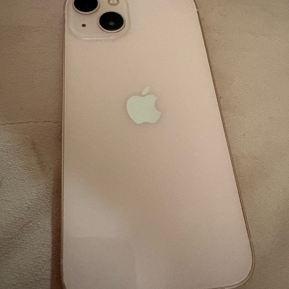 Apple Smartphone in Light Pink. Needs new battery
